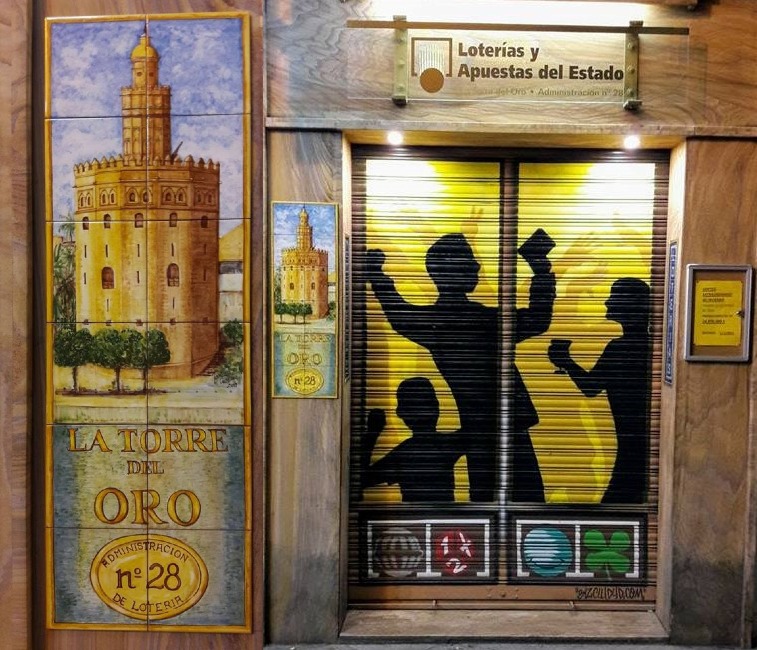 Rotulación y decoración cerámica en tienda de loterías Torre del Oro