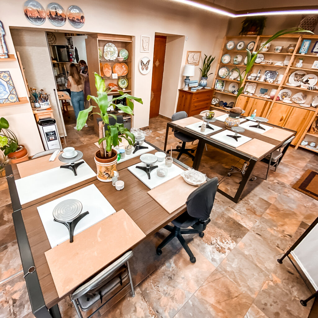 Work tables and ceramic materials in the studio