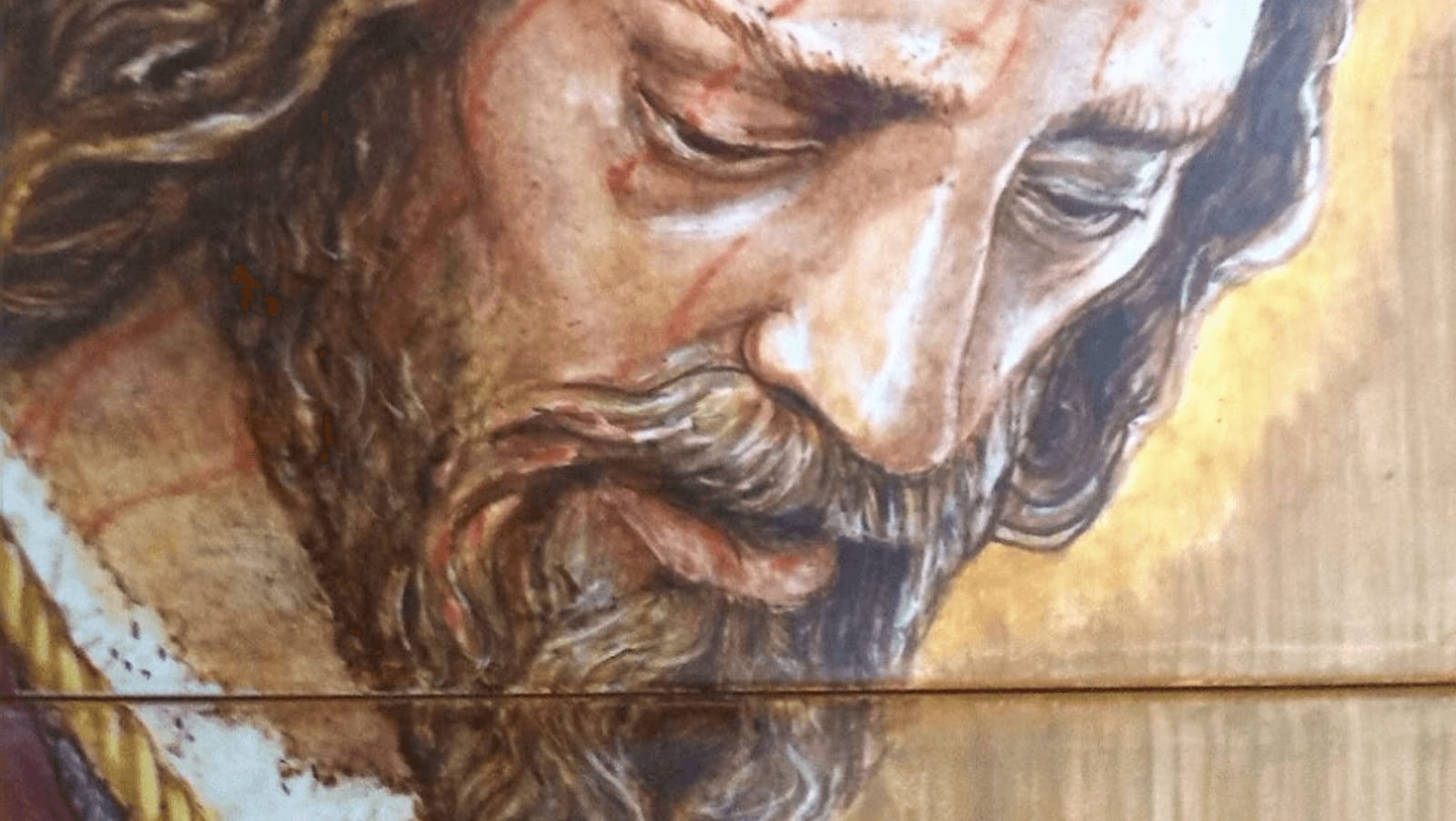 Hand-painted ceramic mural of Cristo de la Pasión at the Triana workshop